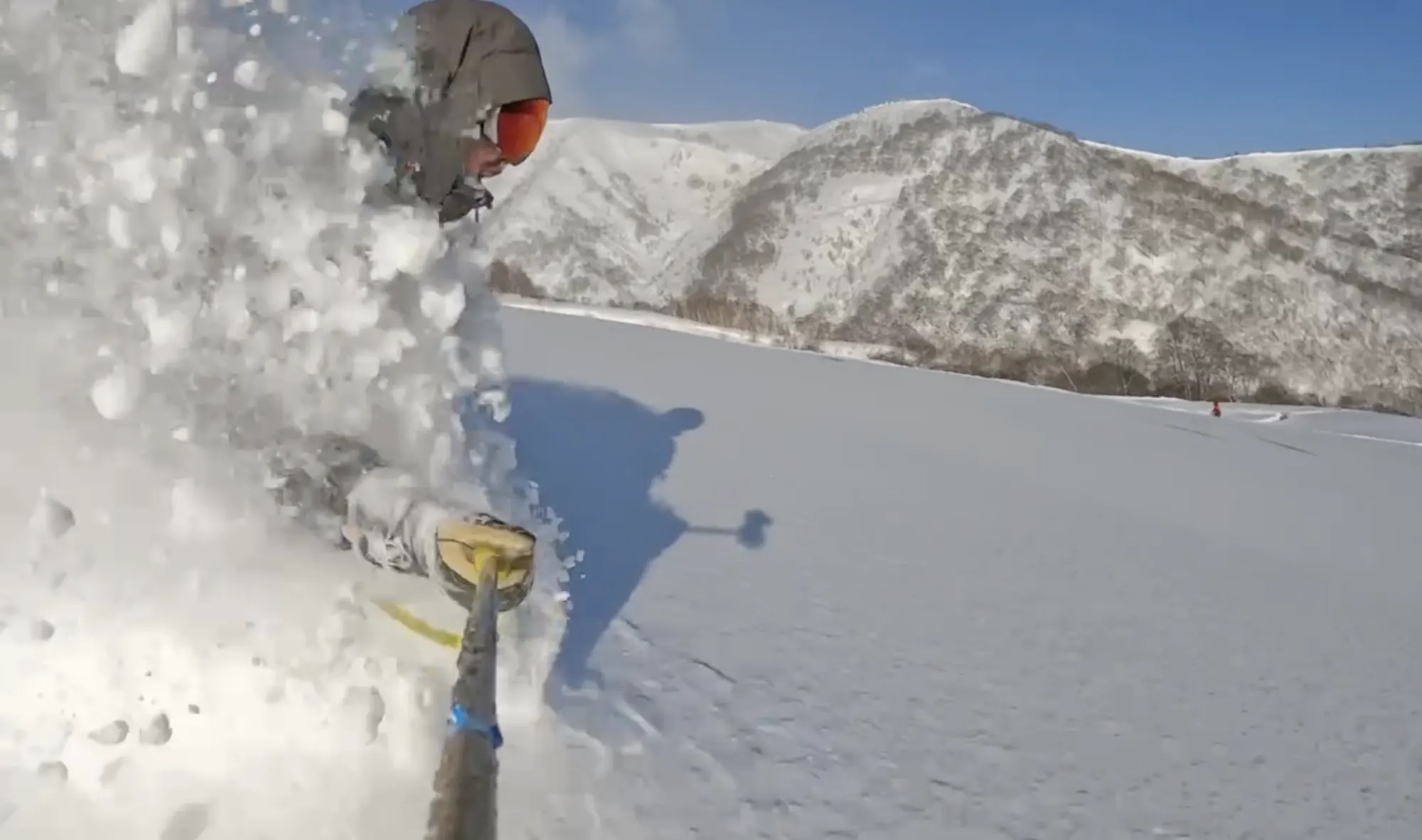 Kazu riding deep powder